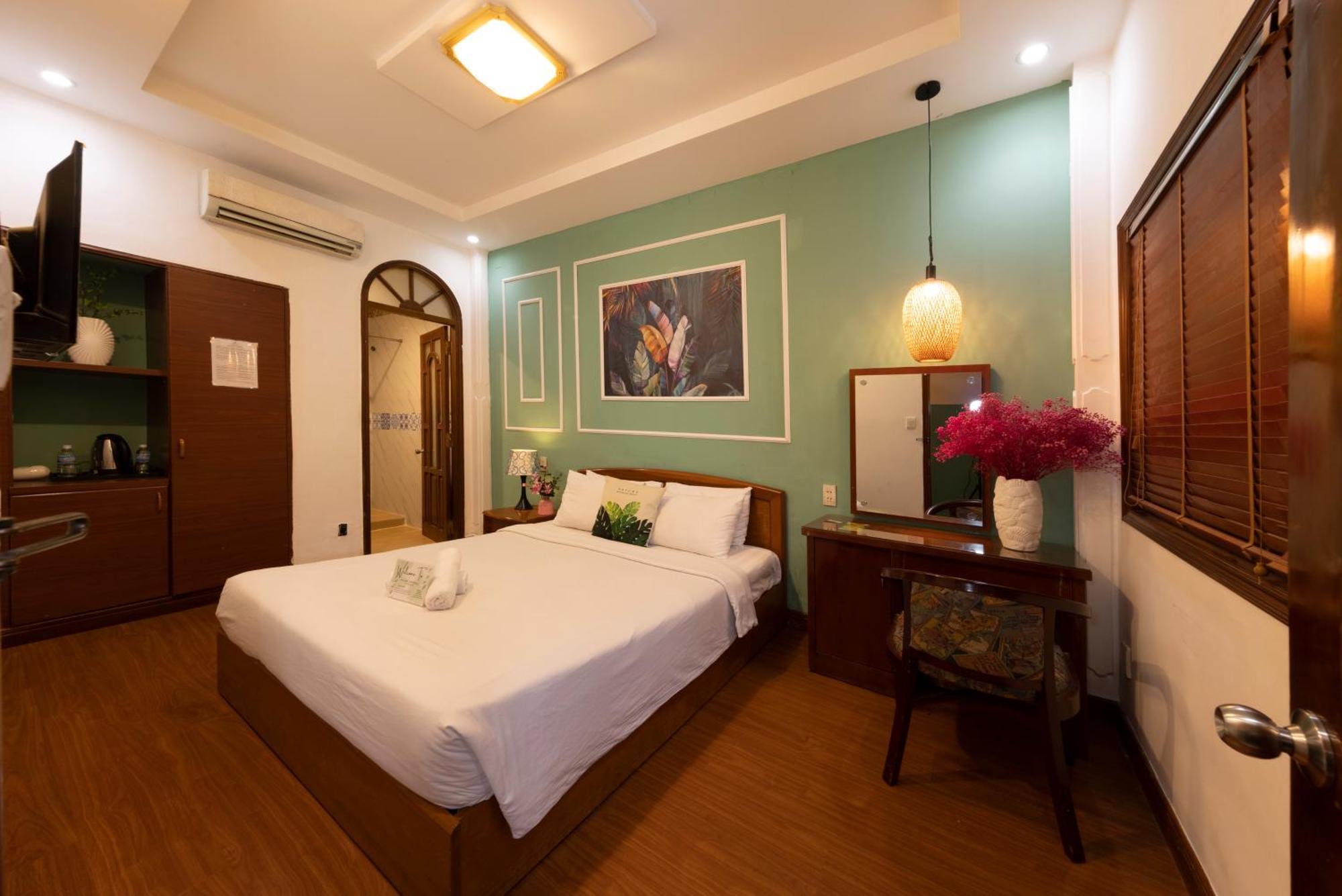 Hotel Vilion & Ho-Chi-Minh-Stadt